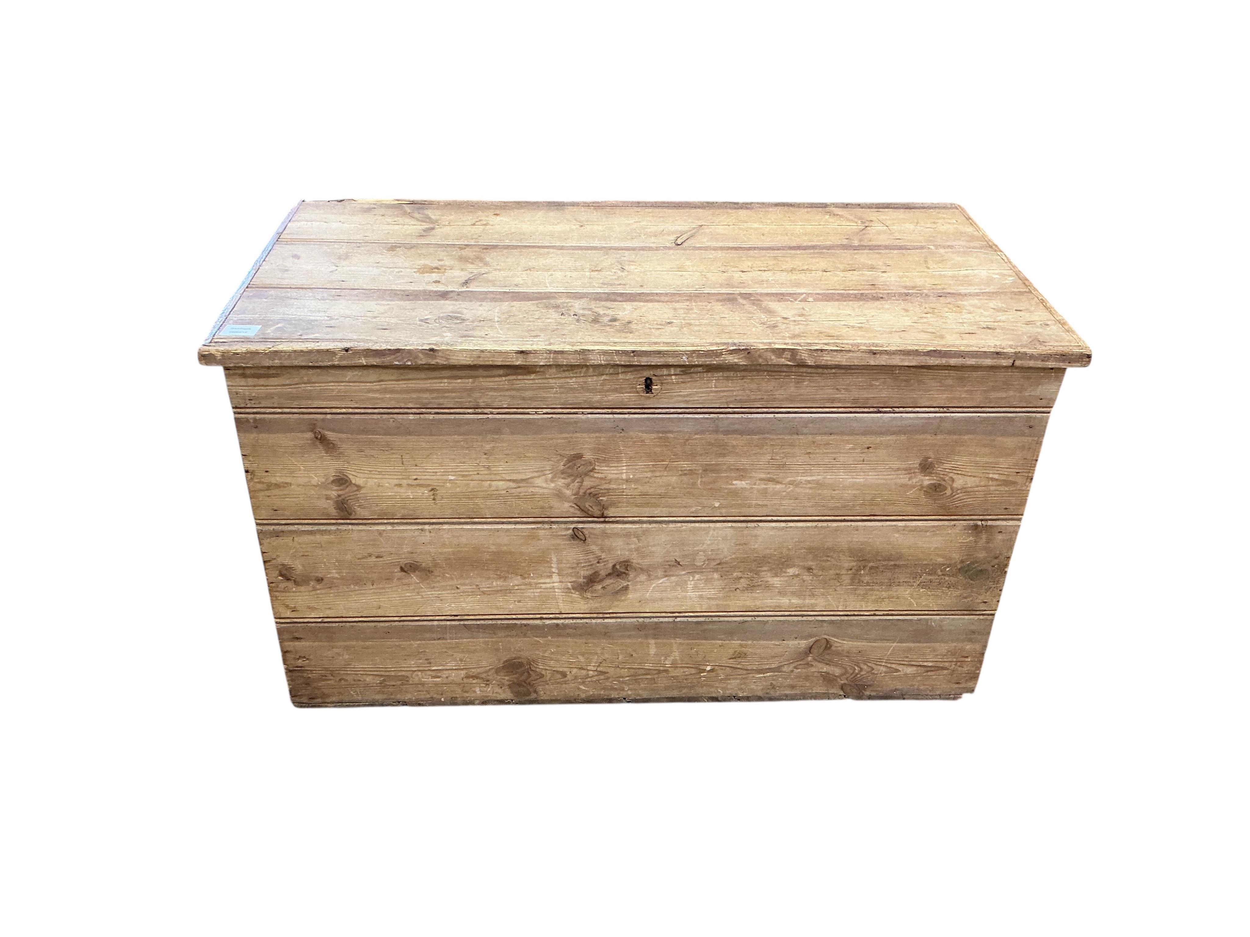 A Victorian pine trunk, width 105cm, depth 53cm, height 59cm